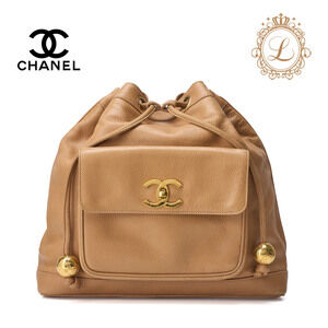 Chanel shoulder bag tote drawstring outside flap chain caviar leather beige